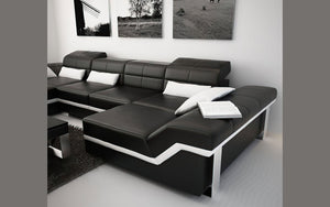 Kaniel Leather Sectional with Adjustable Headrest
