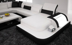 Molinaro Leather Sectional with Adjustable Headrest