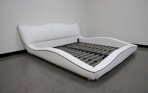 Dax Modern Curved Leather Bed